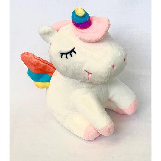 Unicornio de peluche dormido color blanco.