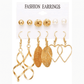 Juego de aretes dorados, estilo pequeños largos