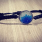 Pulsera tejida azul con Flor de Loto