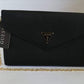 Bolso Guess, color negro y cadena dorada - The Gift Shop Costa Rica
