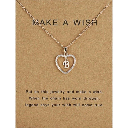 Collar "Make wish" color oro rosa, con dije en forma de corazón letra