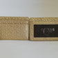 Tarjetero Guess, color oro.