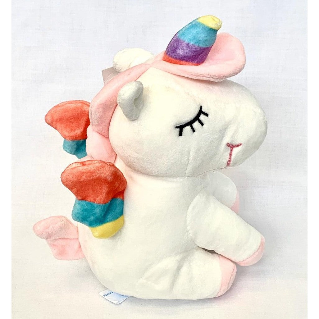 Unicornio de peluche dormido color blanco.
