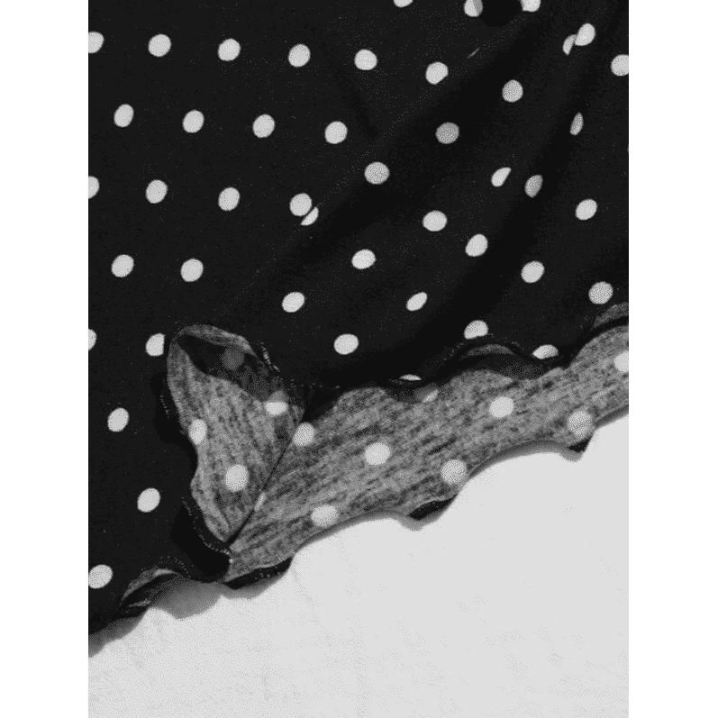 Top de tirantes, color: negro con puntos blancos.